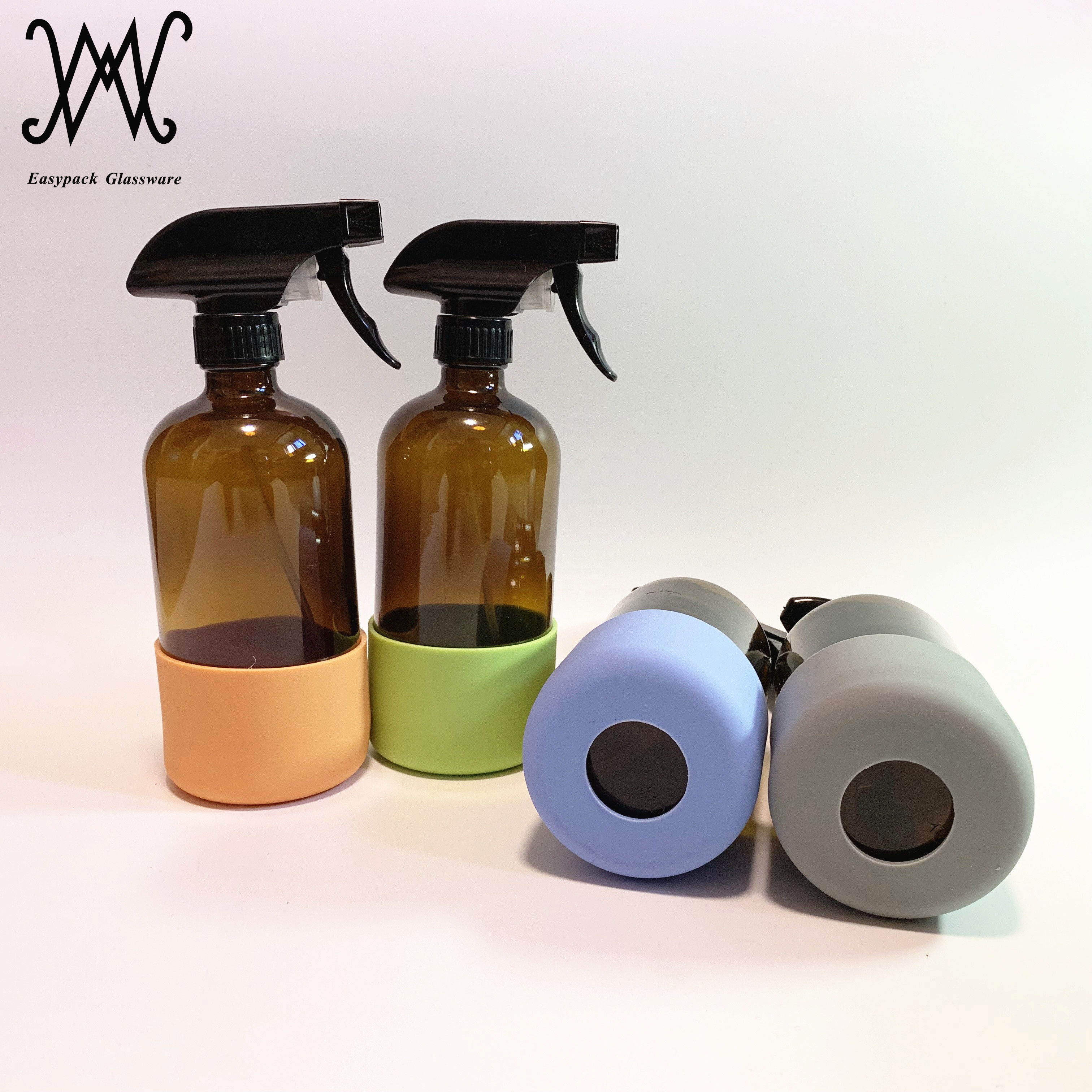 16oz 500ml clear amber cobalt blue boston round glass spray bottle with silicone sleeve custom logo