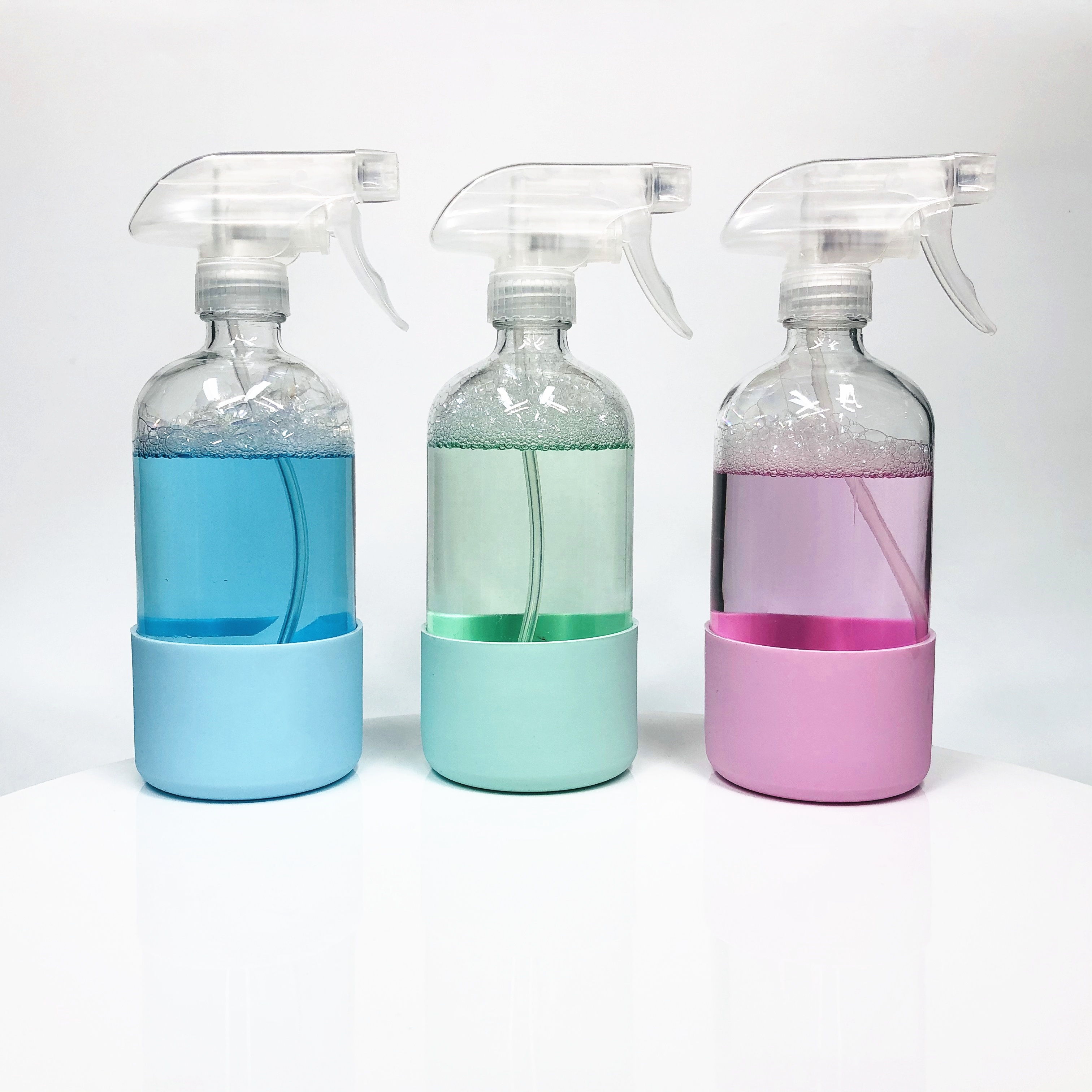 16oz 500ml clear amber cobalt blue boston round glass spray bottle with silicone sleeve custom logo