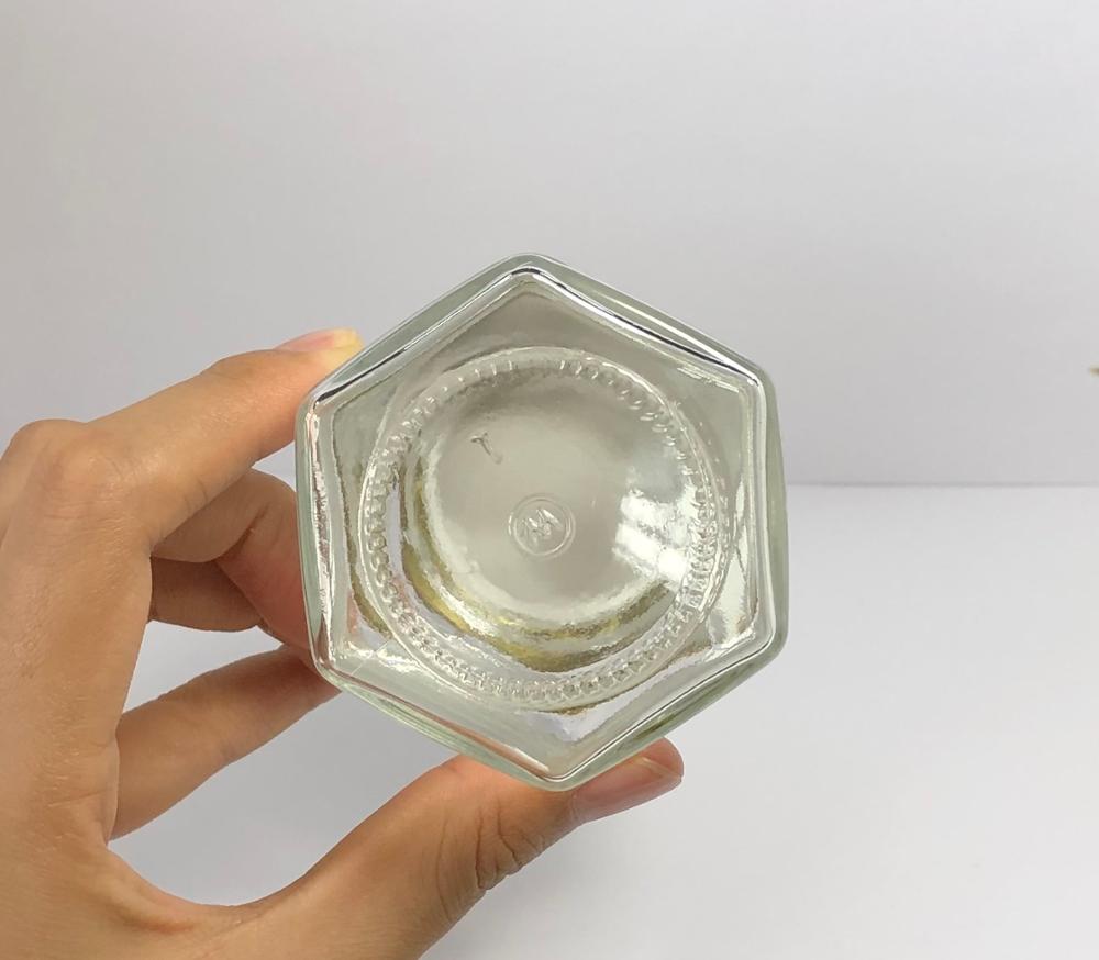 180ml clear hexagonal glass jar with golden metal screw cap