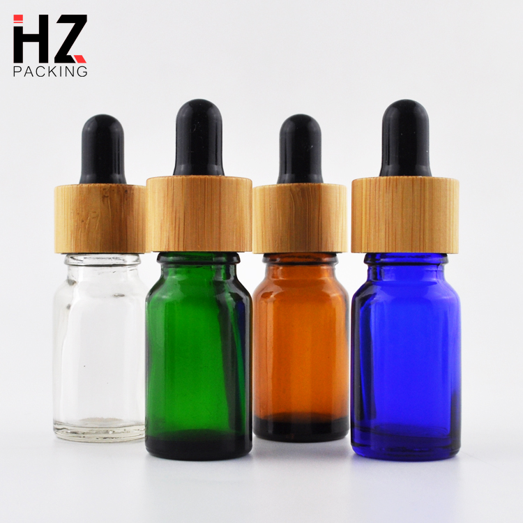 1oz 30ml clear blue brown round glass essential oil dropper bottles with bamboo lid