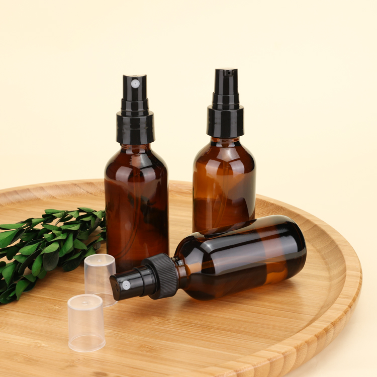 1oz Boston Round Glass Shaded Blue Bottles With Black Spray Tops