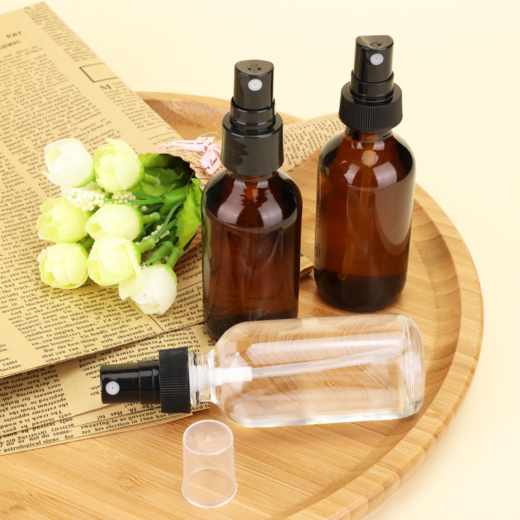 1oz Boston Round Glass Shaded Blue Bottles With Black Spray Tops