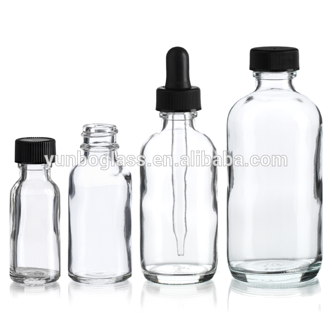 1oz. Clear Boston Round Glass Bottle With White Treatment Pump Dispensing