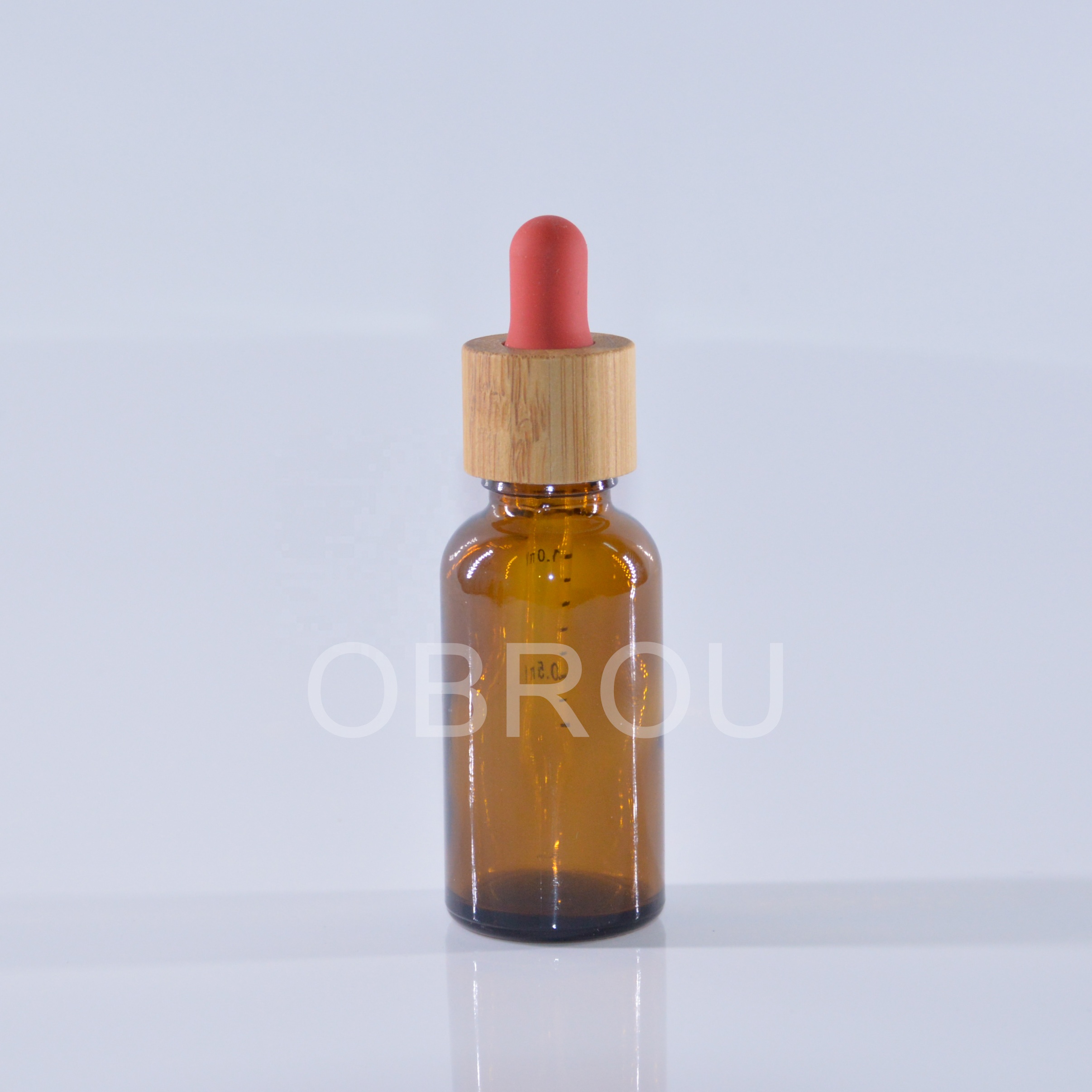 1oz amber glass essential oil dropper bottle with glass scale pipette and bamboo cap red teat