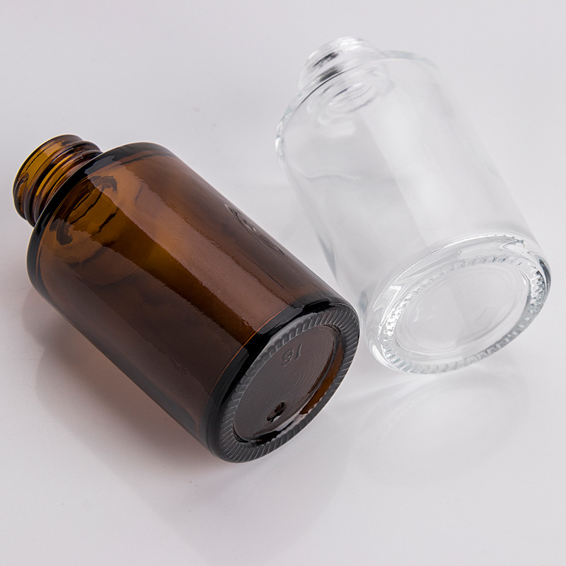 1oz flat shoulder clear glass dropper bottle with black lid for cosmetic packaging