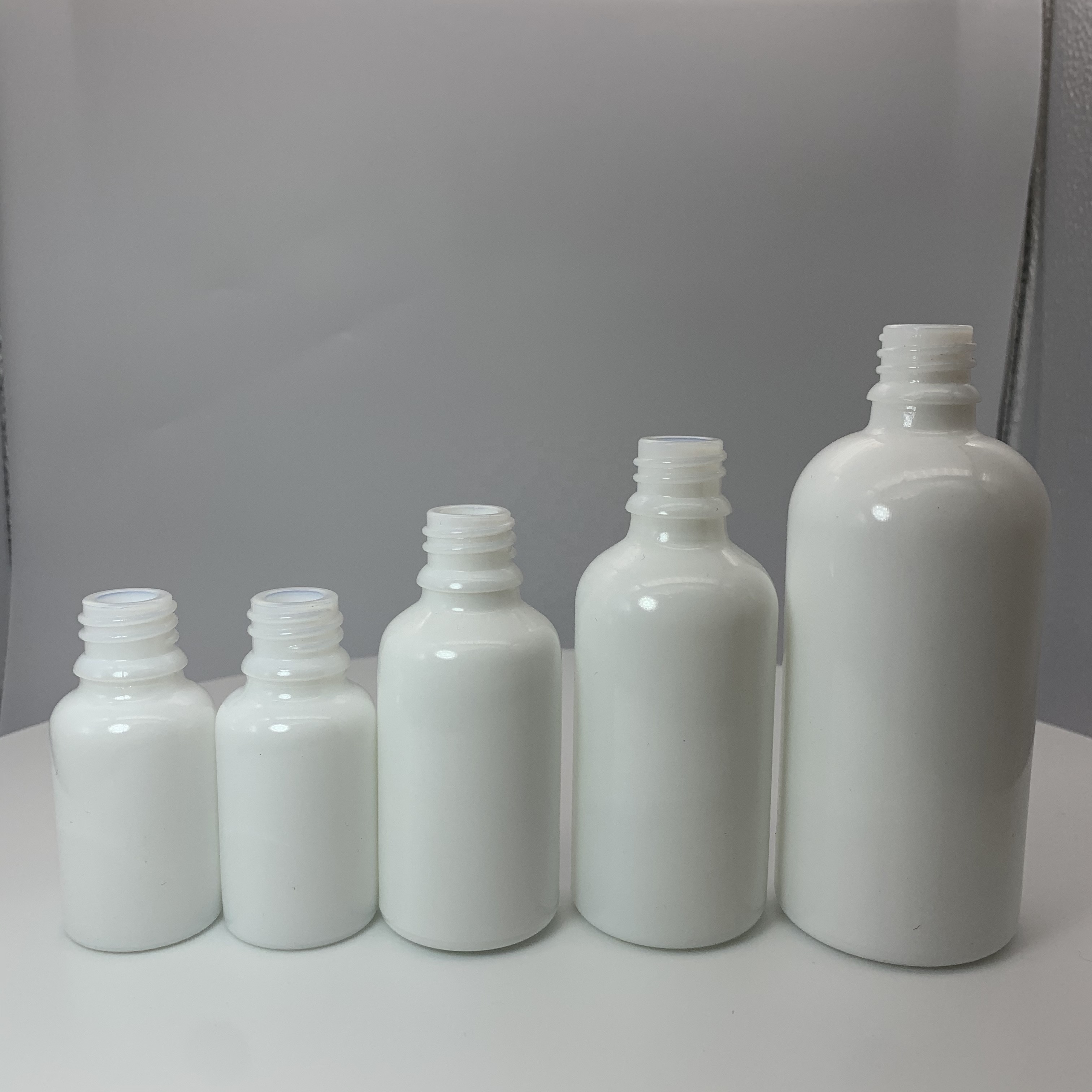 1oz opal white porcelain round serum bottles