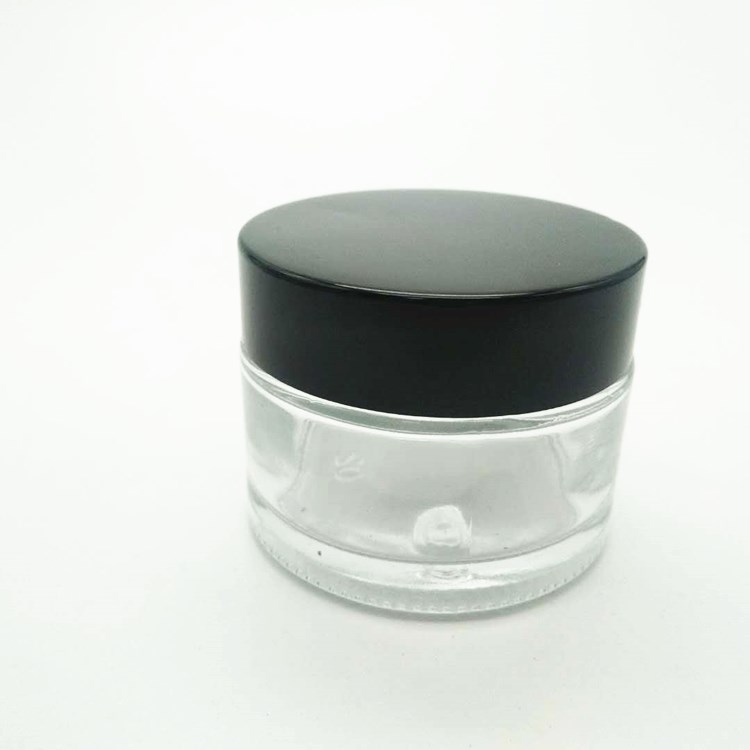 1oz round empty clear glass jar with screw cap