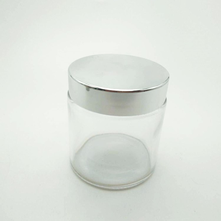 1oz round empty clear glass jar with screw cap