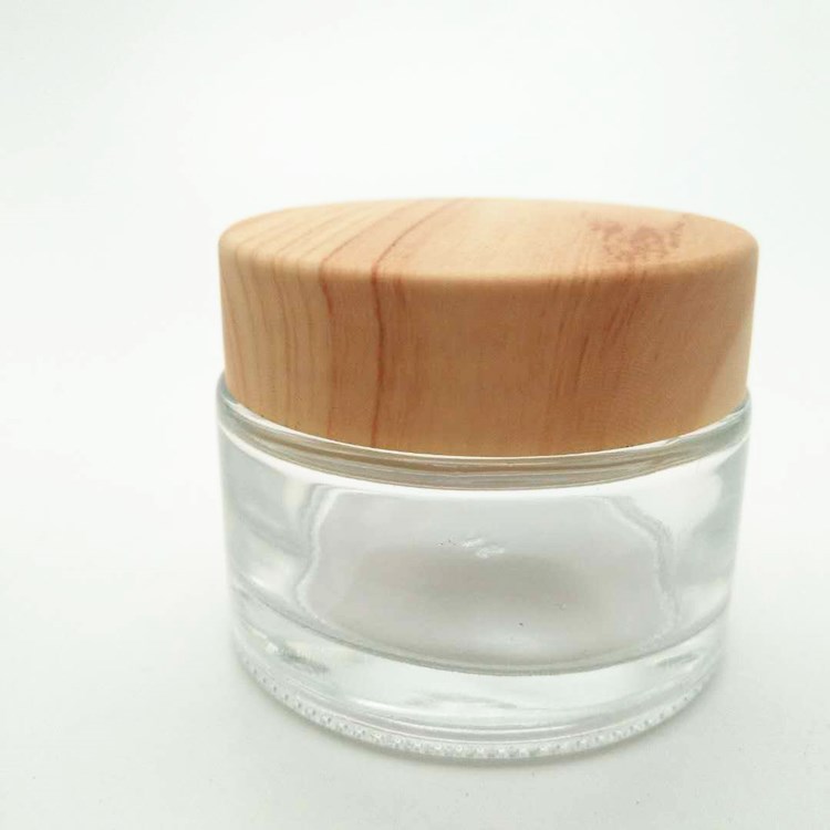 1oz round empty clear glass jar with screw cap