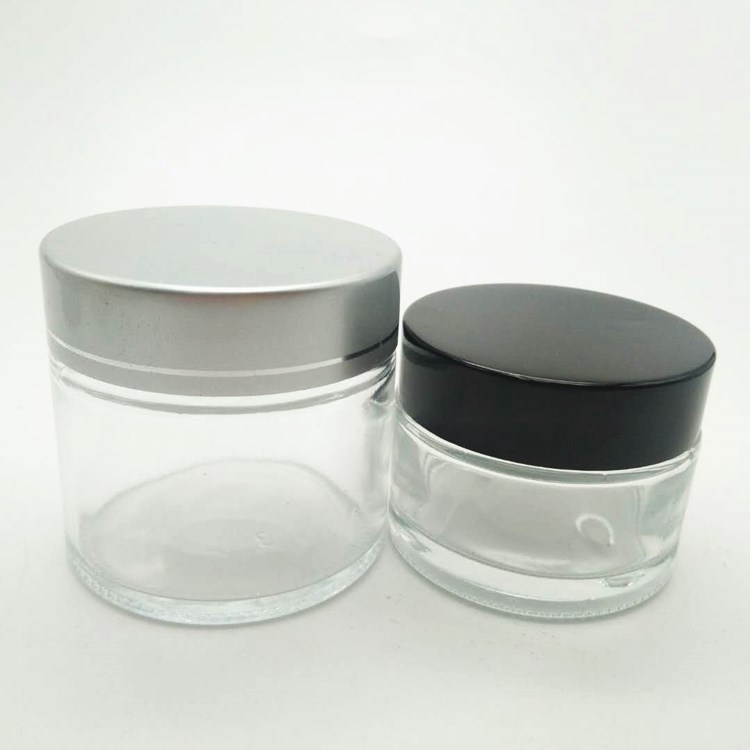 1oz round empty clear glass jar with screw cap