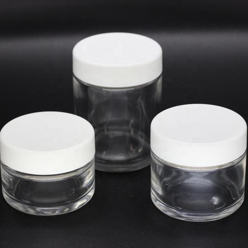 2 oz 60ml round straight side transparent glass jar with black child resistant lids