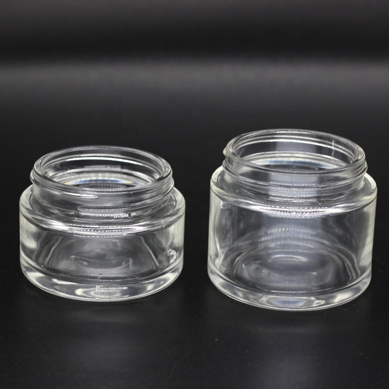 2 oz 60ml round straight side transparent glass jar with black child resistant lids