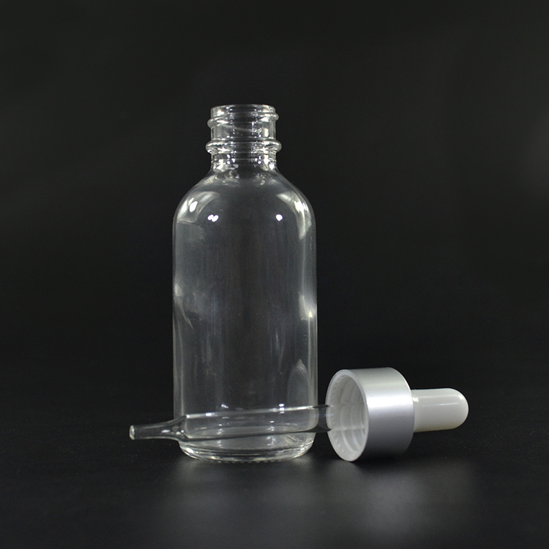 2 oz Clear Glass Boston Round Bottle with Gold Metal and Glass Dropper