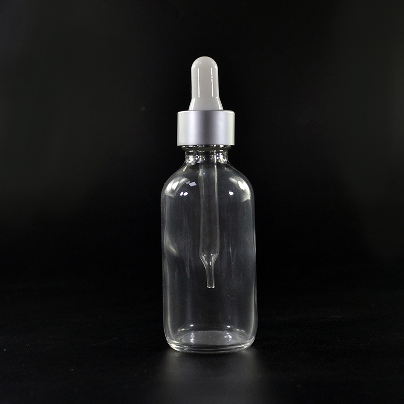 2 oz Clear Glass Boston Round Bottle with Gold Metal and Glass Dropper