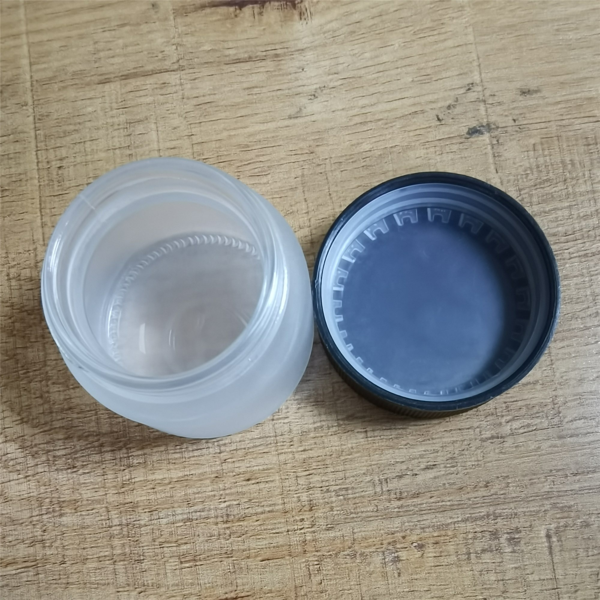 2 oz Frosted Child Resistant Glass Jar with Black Lids - Weed Flower Container