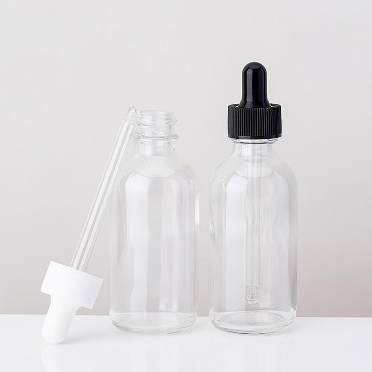 2 oz boston round glass dropper bottles clear essential oil bottle for serum packaging