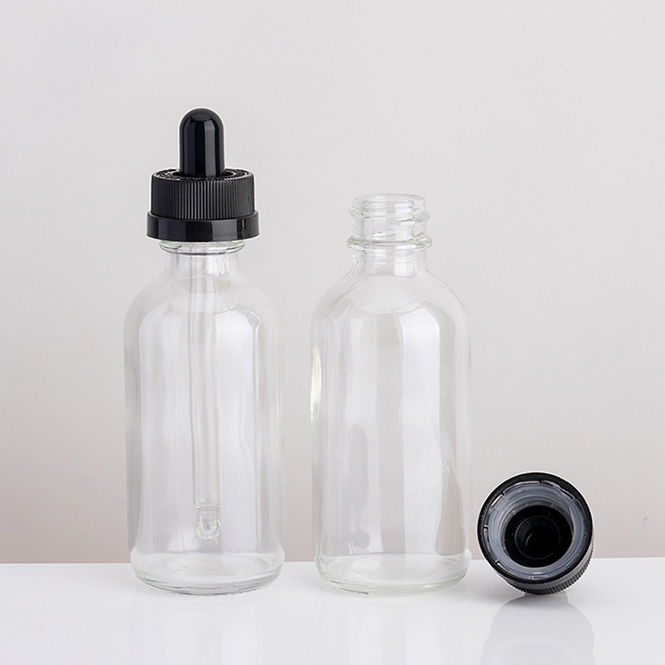2 oz boston round glass dropper bottles clear essential oil bottle for serum packaging
