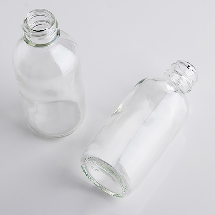 2 oz boston round glass dropper bottles clear essential oil bottle for serum packaging