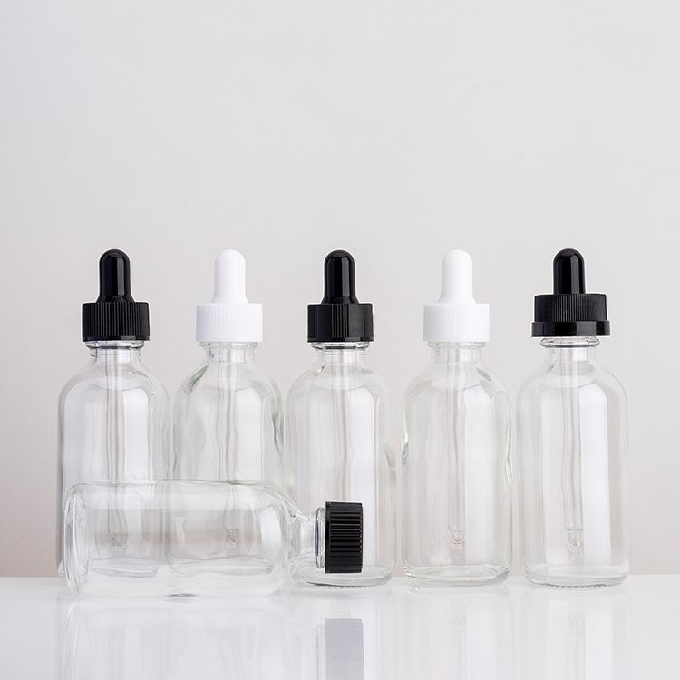 2 oz boston round glass dropper bottles clear essential oil bottle for serum packaging