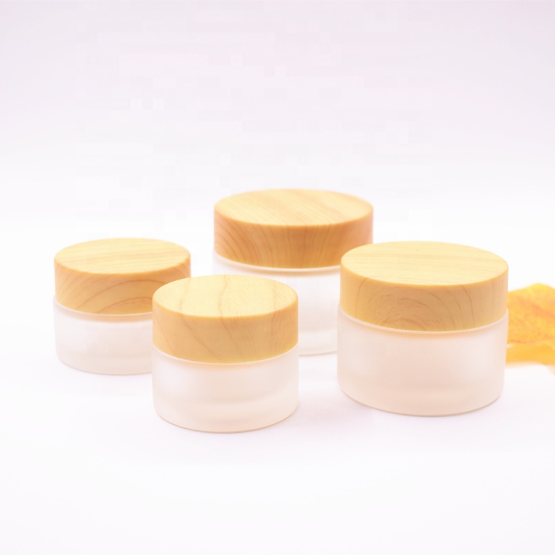 2018 New Top Quality Luxury Simple Round 10g 20g 30g 50g 100g frosted Glass Cream Jar with wooden like lid