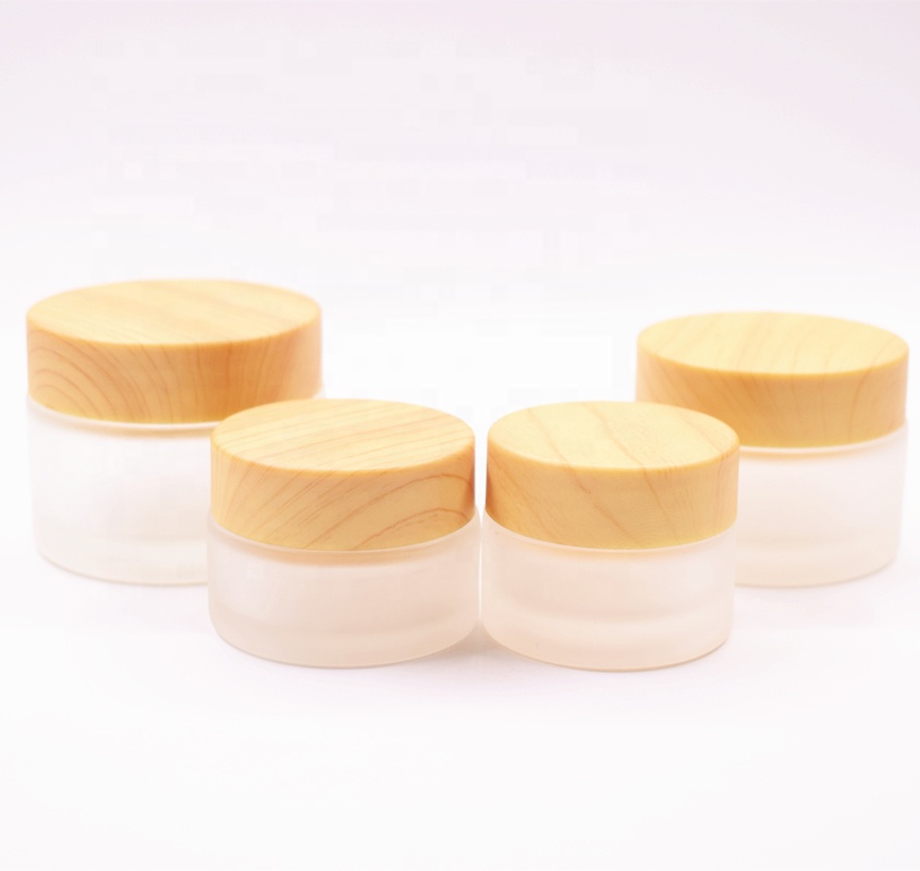 2018 New Top Quality Luxury Simple Round 10g 20g 30g 50g 100g frosted Glass Cream Jar with wooden like lid