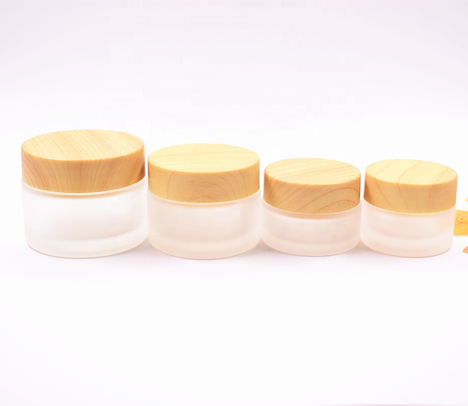 2018 New Top Quality Luxury Simple Round 10g 20g 30g 50g 100g frosted Glass Cream Jar with wooden like lid