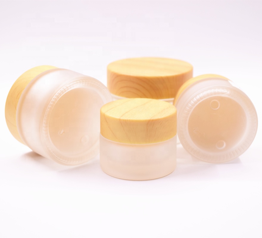 2018 New Top Quality Luxury Simple Round 10g 20g 30g 50g 100g frosted Glass Cream Jar with wooden like lid