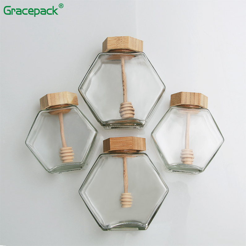 2019 Popular sales empty glass hexagon honey jar, glass jar hexagonal