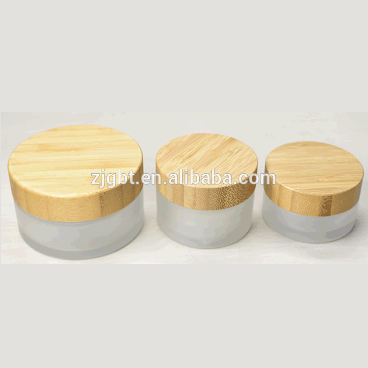 2020 Hot Sale round shape transparent/froested glass container with Bamboo cap skin care Bamboo lid cream jars cosmetic in stock