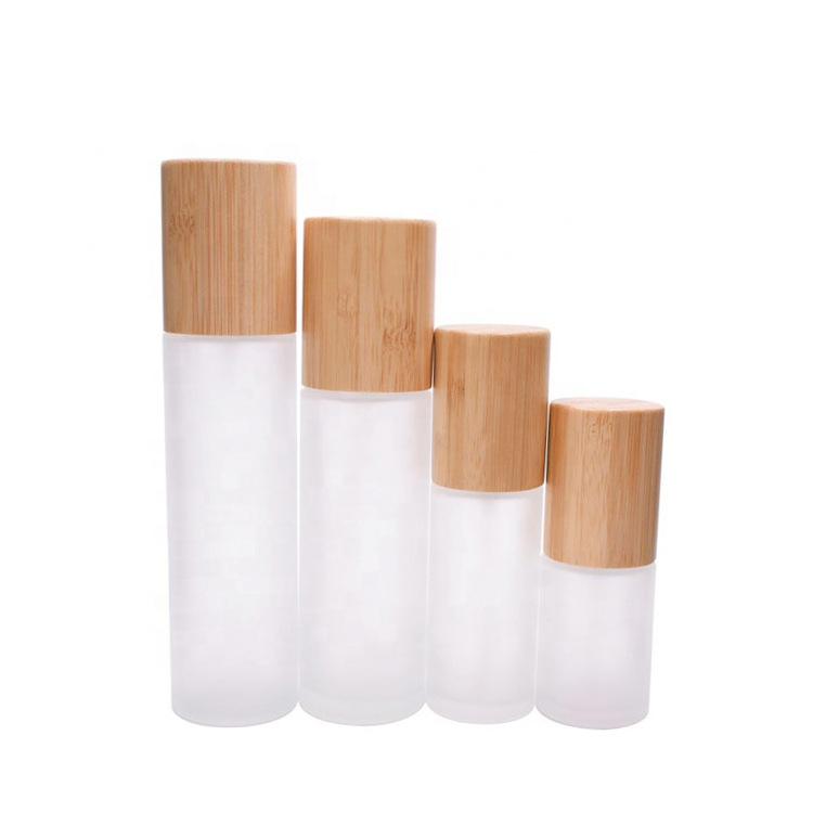 2020 Hot Sell Cylinder Shape Frosted Glass Bamboo Lotion Pump Emulsion Bottle Portable Travel Spray Bottle
