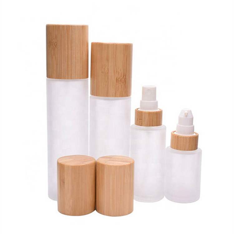2020 Hot Sell Cylinder Shape Frosted Glass Bamboo Lotion Pump Emulsion Bottle Portable Travel Spray Bottle
