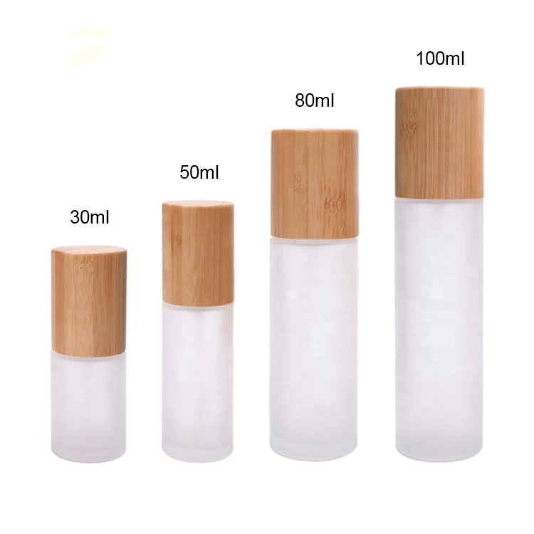 2020 Hot Sell Cylinder Shape Frosted Glass Bamboo Lotion Pump Emulsion Bottle Portable Travel Spray Bottle