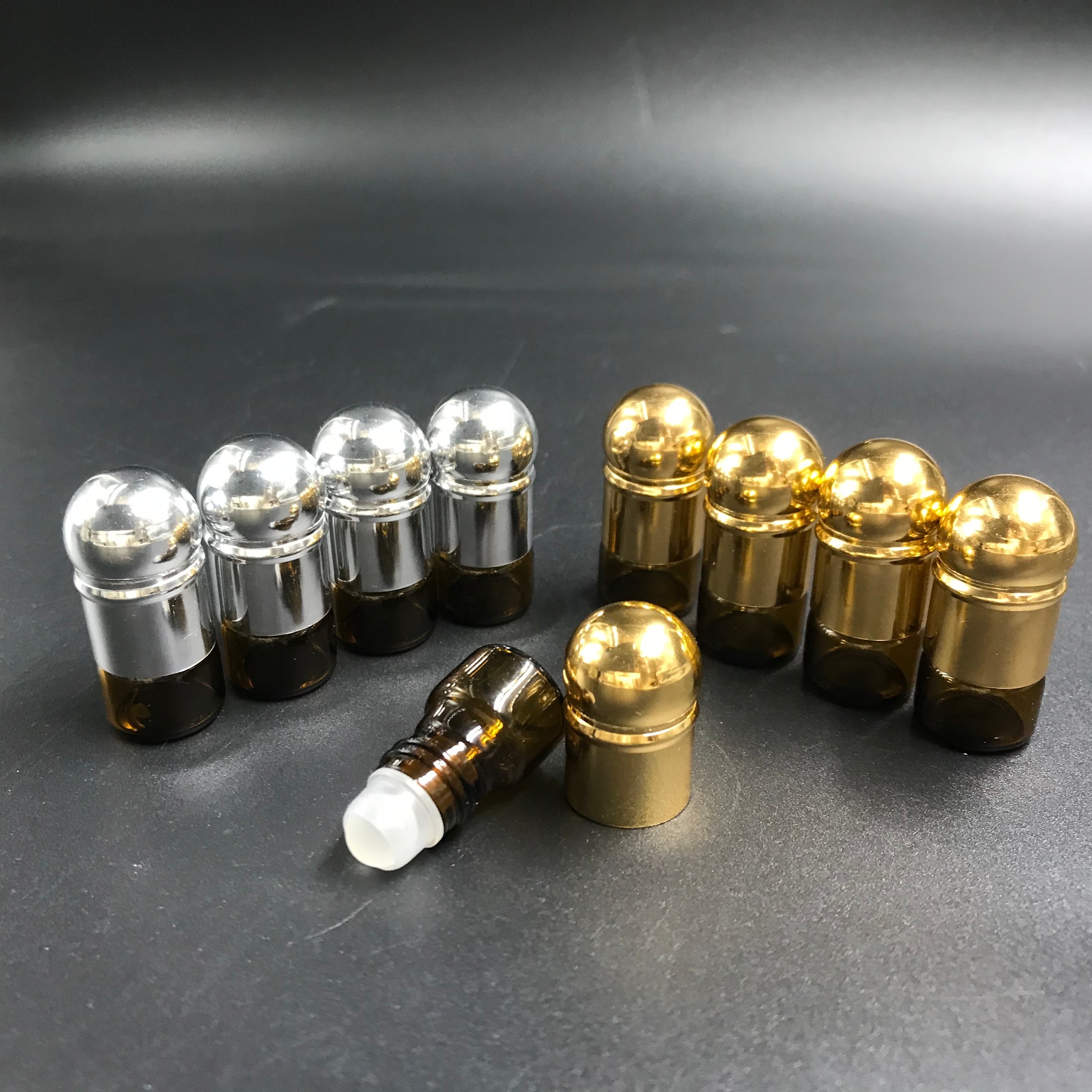 2020 New Design 1ML Wholesale Arabian Attar Roll On Amber Mini Glass Bottle For Oud Oil And Perfume