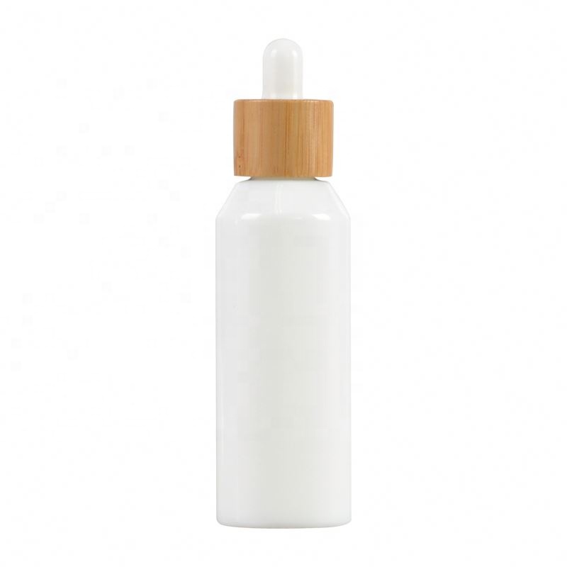 2020 New developed opal white glass cosmetic bamboo bottle with bamboo cap glass bamboo lid bottle