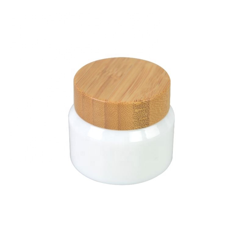 2020 New developed opal white glass cosmetic bamboo bottle with bamboo cap glass bamboo lid bottle