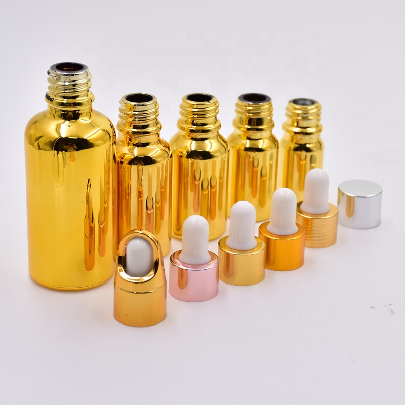 2020 new 5ml 10ml 15ml 20m l30ml 50ml 100ml gold plating round cosmetic essential oil glass bottles with dropper top