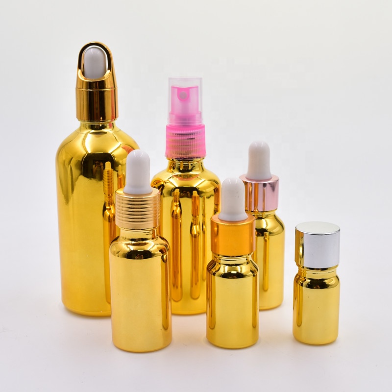 2020 new 5ml 10ml 15ml 20m l30ml 50ml 100ml gold plating round cosmetic essential oil glass bottles with dropper top