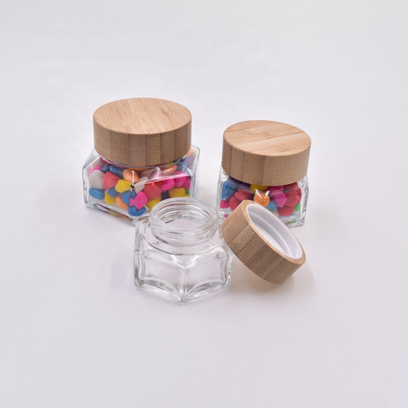 2020 new design 30ml clear hexagon glass honey jar face cream jar bottles jam pots for jam with screw top bamboo lid wooden cap