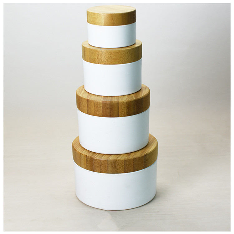2020 year hot sales 15g 30g 50g 100g frosted clear glass jar with bamboo wooden lid