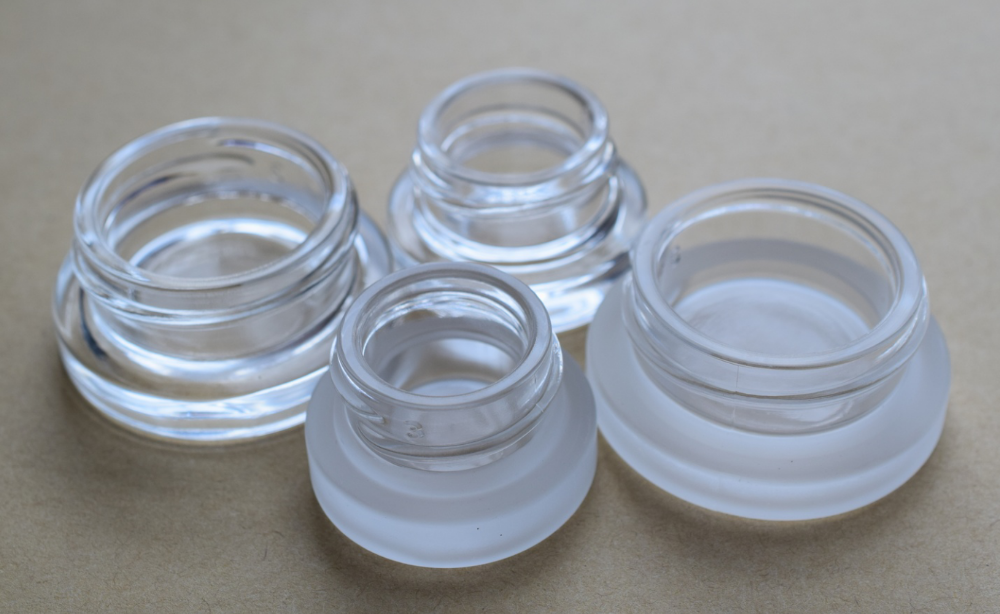 2021 A Thick Bottom Low Profile 3ml 5ml 7ml Glass Concentrate Jars with Black Plastic Lids Child Resistant Lid