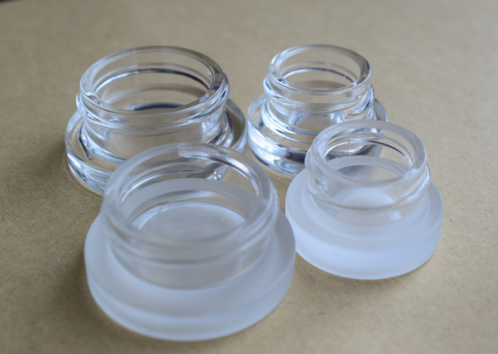 2021 A Thick Bottom Low Profile 3ml 5ml 7ml Glass Concentrate Jars with Black Plastic Lids Child Resistant Lid