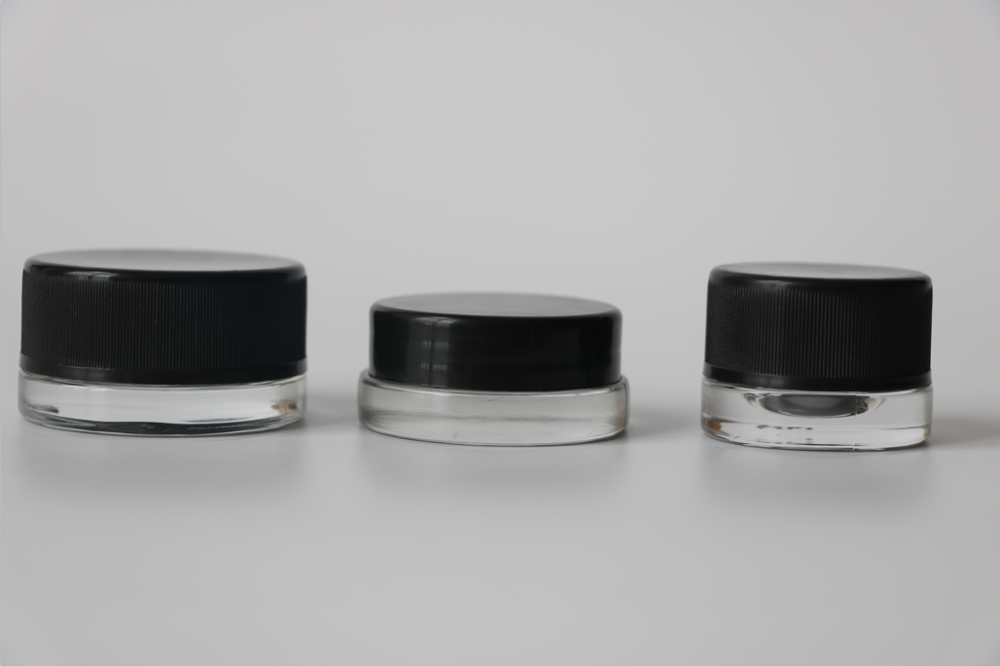 2021 A Thick Bottom Low Profile 3ml 5ml 7ml Glass Concentrate Jars with Black Plastic Lids Child Resistant Lid