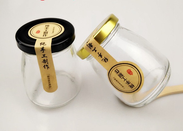 2021 Cheap 50ml 100ml food container yogurt milk clear glass bottles storage pudding jar with plastic lid metal lids