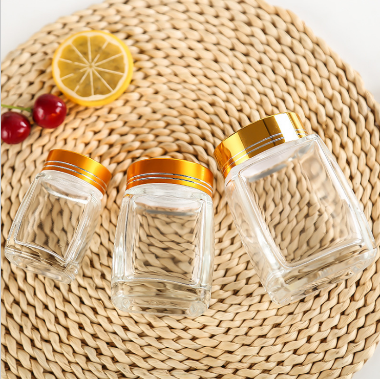 2021 Wholesale transparent 8oz 10oz 11oz 12oz Square Glass Honey Container Honey Storage Bottle Glass Honey Jar With Matel Lid