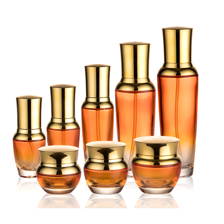 20g 30g 50g 20ml 30ml 50ml 100ml fancy unique special orange clear glass bottle and jar set with uv gold lid and pump