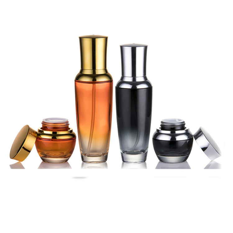 20g 30g 50g 20ml 30ml 50ml 100ml fancy unique special orange clear glass bottle and jar set with uv gold lid and pump