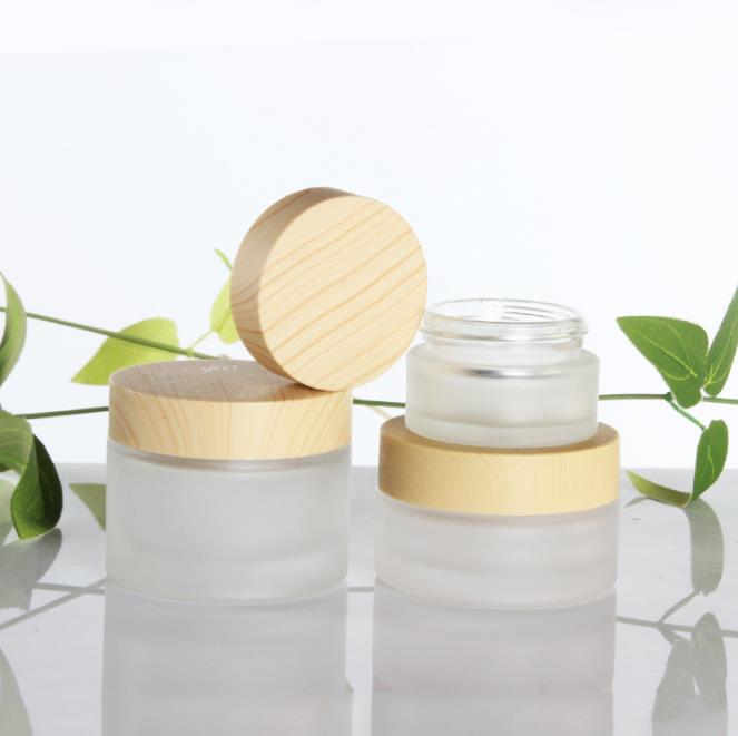 20g 30g 50g clear frosted glass skincare cream jars 40ml-120ml lotion pump bottles with wood grain cap bamboo lid