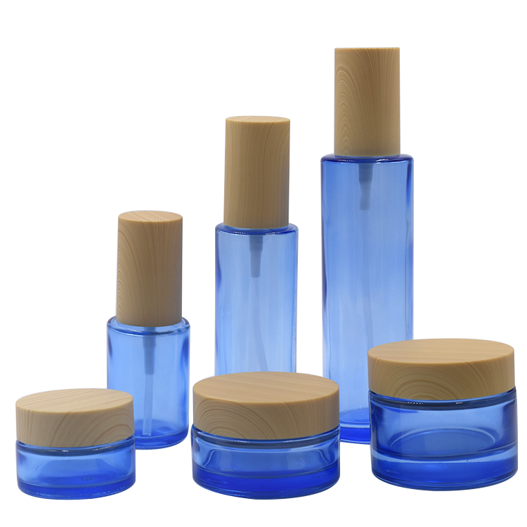 20g 30g 50g small free sample factory price low moq high quality empty flat shoulder clear blue round glass jar with plastic lid