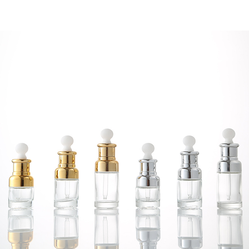 20ml 30ml 50ml OEM or ODM Gold or silver balloon glue head transparent glass dropper Essential oil or Hair oil bottle