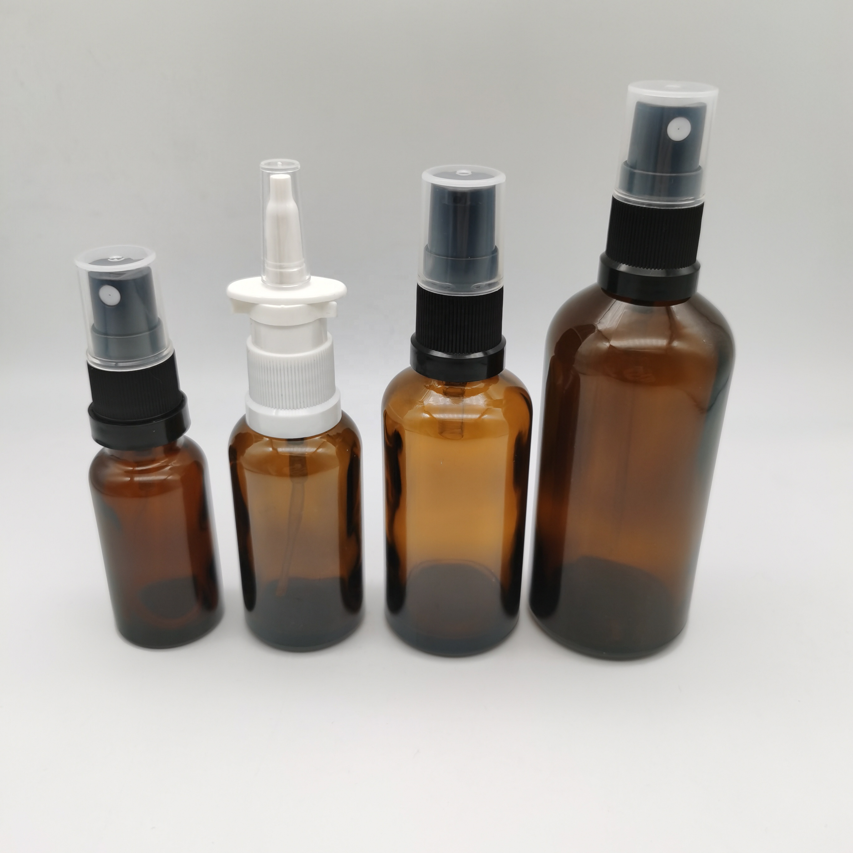 20ml amber glass bottle with tamper evident sprayer for glass cosmetic packaging